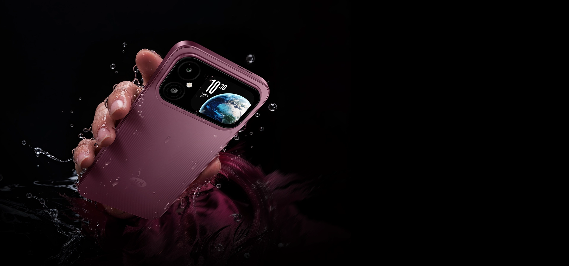 A300+ held in a hand with water splashing around the phone